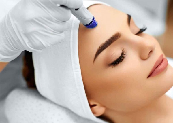 dermatologist treating patient